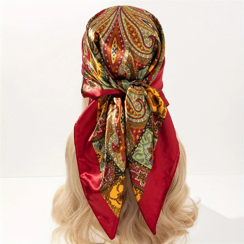 Elegant paisley print scarf styled as a fashionable necktie or handbag accessory