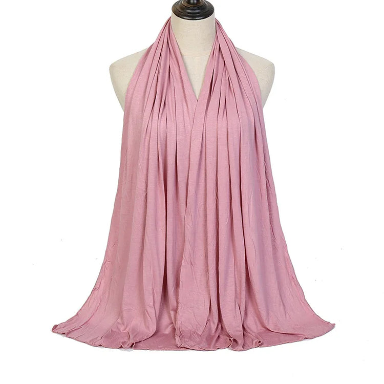 Long Muslim shawl made of modal cotton jersey fabric, wrapped elegantly around the head and ne