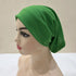Lightweight spandex turban bonnet in beige, styled under a chiffon hijab