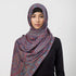 Soft and warm cashmere hijab with bohemian print, styled as a headscarf or wrap