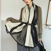 Elegant striped shawl wrap with tassel ends, suitable for casual and formal wear