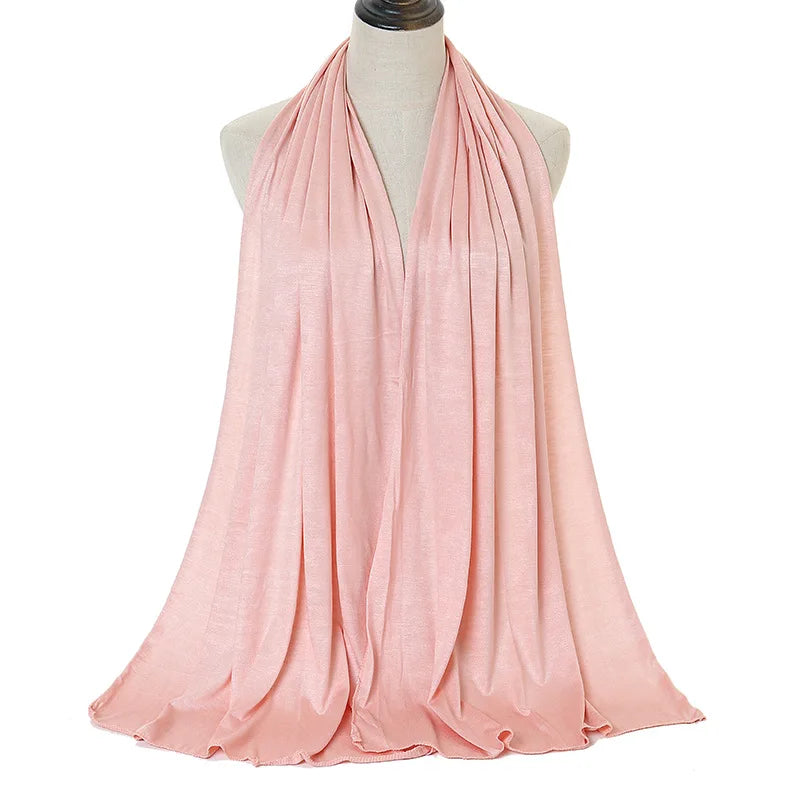 Long Muslim shawl made of modal cotton jersey fabric, wrapped elegantly around the head and ne
