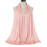 Long Muslim shawl made of modal cotton jersey fabric, wrapped elegantly around the head and ne