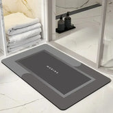 Water-absorbing bath mat with anti-skid backing