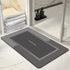 Water-absorbing bath mat with anti-skid backing
