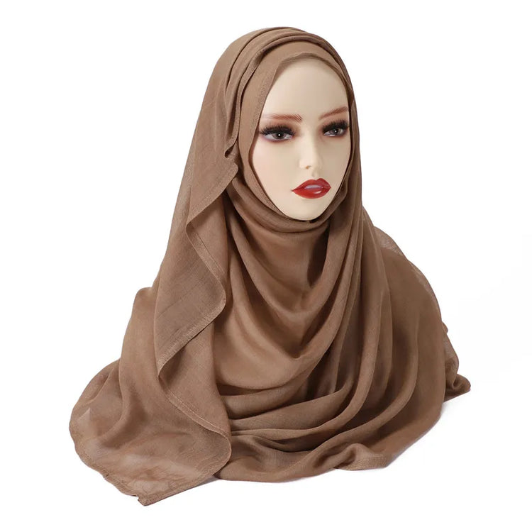 Elegant large hijab scarf in plain design, ideal for prayer, casual wear, or layering