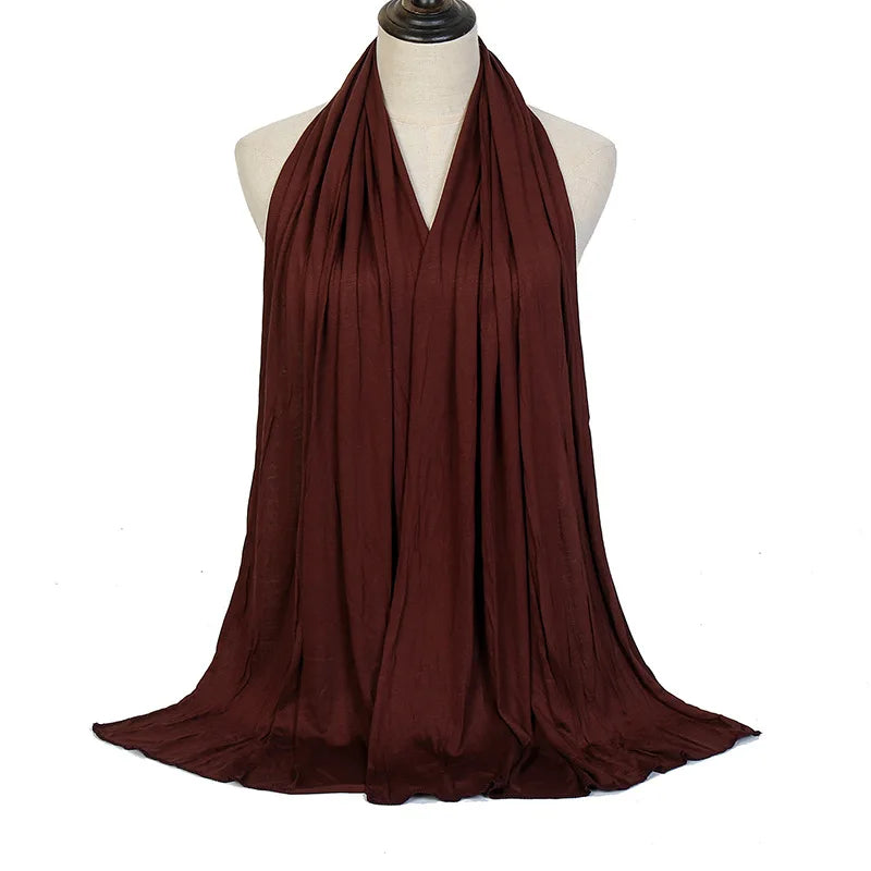 Long Muslim shawl made of modal cotton jersey fabric, wrapped elegantly around the head and ne