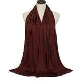 Long Muslim shawl made of modal cotton jersey fabric, wrapped elegantly around the head and ne
