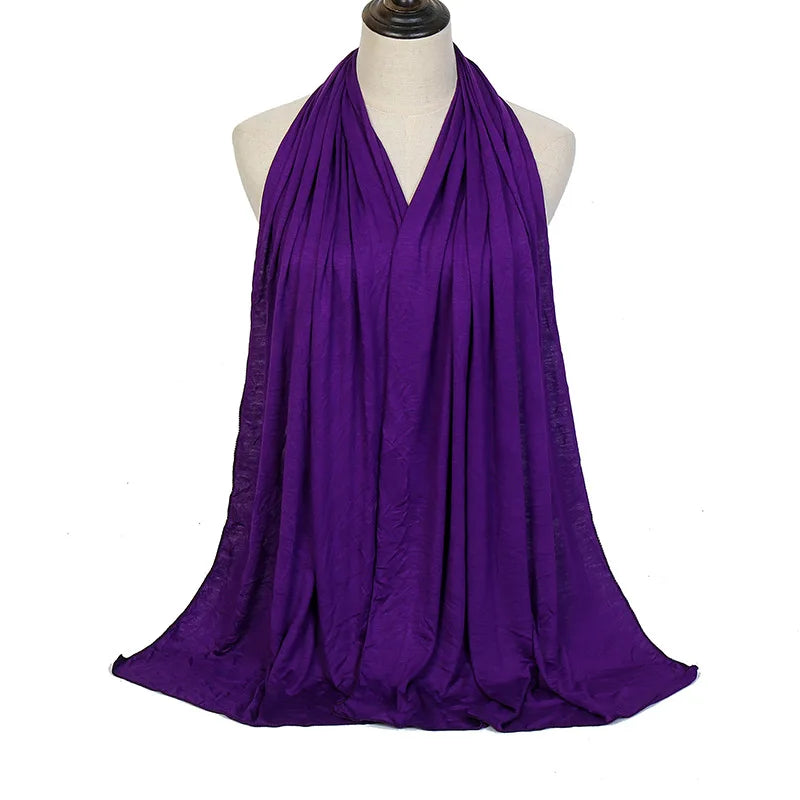 Long Muslim shawl made of modal cotton jersey fabric, wrapped elegantly around the head and ne