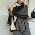 Elegant striped shawl wrap with tassel ends, suitable for casual and formal wear