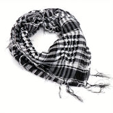 Arab shemagh scarf with traditional houndstooth pattern, styled as a face and neck wrap for sun protection