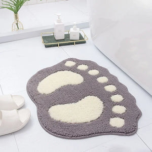 Water absorbent bathroom rug with non-slip backing