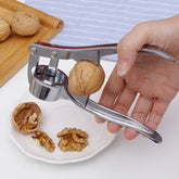 Stainless steel manual garlic press for crushing garlic into paste