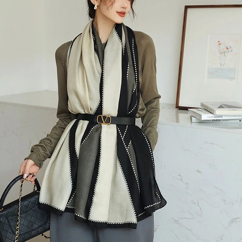 Elegant striped shawl wrap with tassel ends, suitable for casual and formal wear