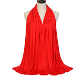 Long Muslim shawl made of modal cotton jersey fabric, wrapped elegantly around the head and ne