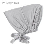 Soft elastic modal underscarf in beige, providing comfortable fit under hijabs for Muslim women 