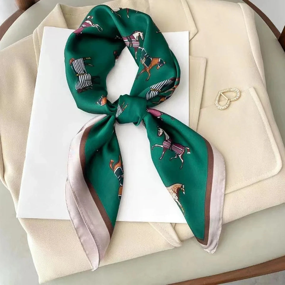 Elegant silk-feel scarf featuring intricate patterns, used as a headband or hair accessory