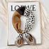 Polka dot silk bandana for women, worn as a ribbon, shawl, or stylish hijab