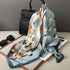 Luxury brand silk plaid square scarf for women, styled as a neck or hair tie