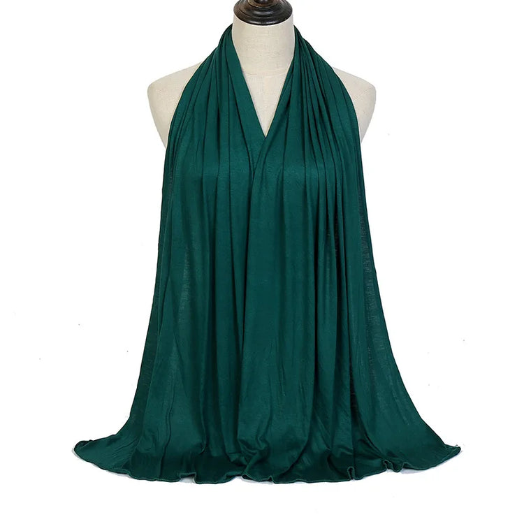 Long Muslim shawl made of modal cotton jersey fabric, wrapped elegantly around the head and ne