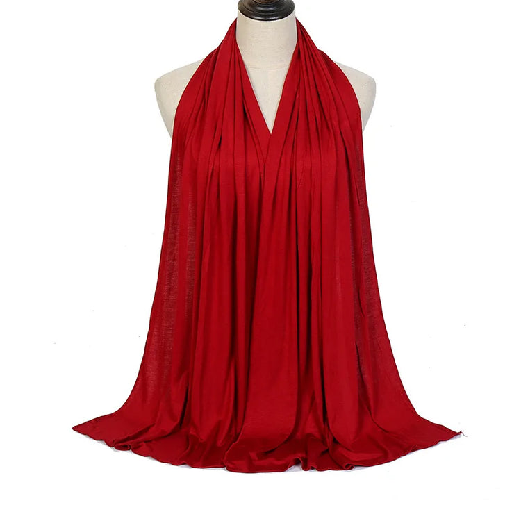 Long Muslim shawl made of modal cotton jersey fabric, wrapped elegantly around the head and ne