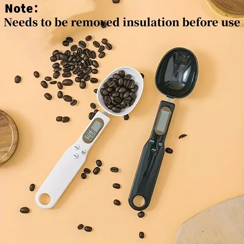 Electronic kitchen scale measuring 0.1–500g with detachable spoon